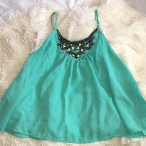 Teal tank with beading